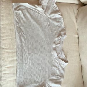 Lululemon size 8 White train to be short sleeve shirt